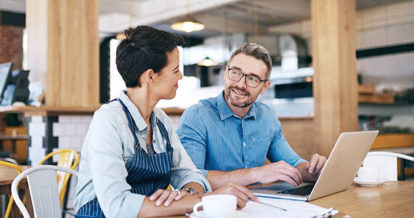 restaurant manager and server having a meeting