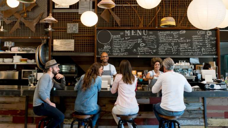 Patrons sitting at a counter