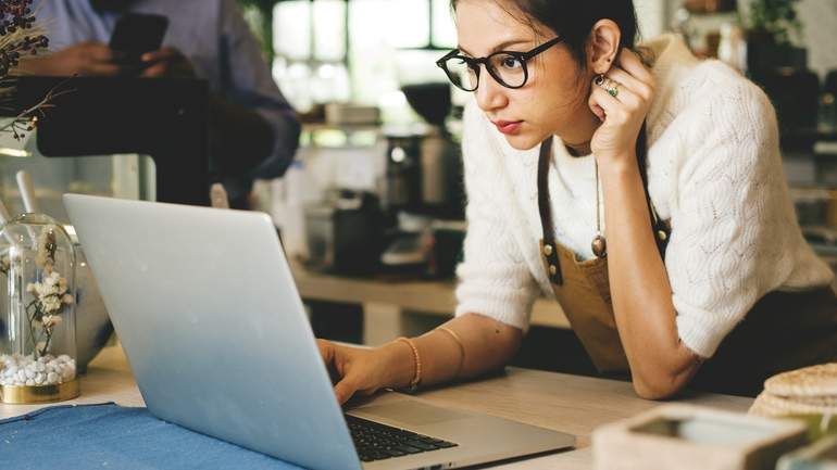 Business owner using a laptop