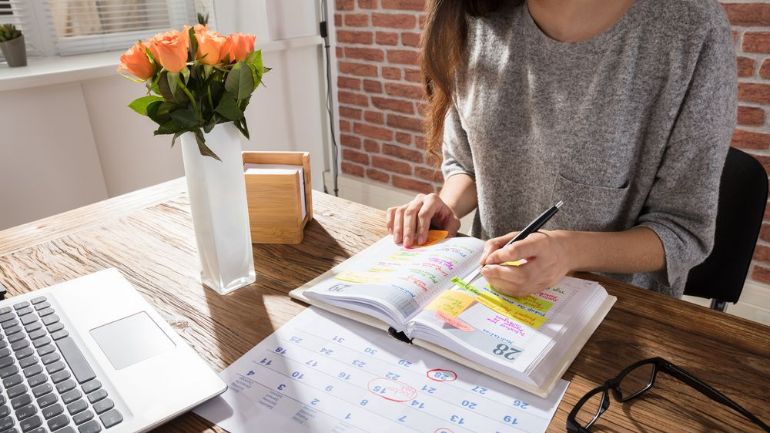 Restaurant owner working on scheduling