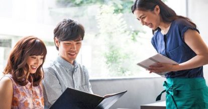 Server taking order from customers