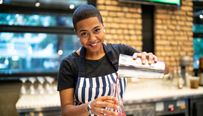 Bartender pouring a drink