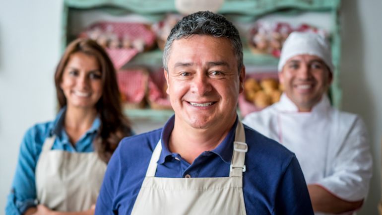 Smiling restaurant staff.