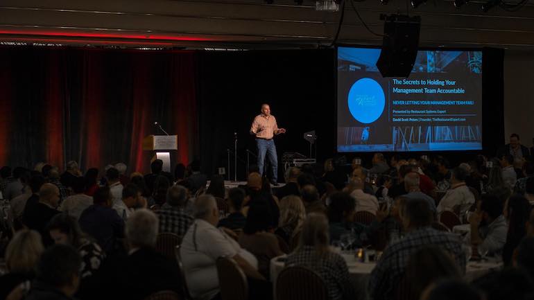 David Scott Peters speaking at an event.