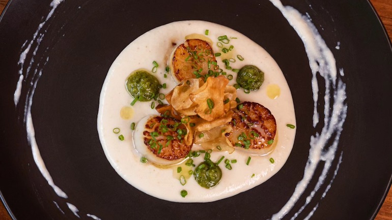 Beautifully plated scallops dish from  Tango Nuevo.